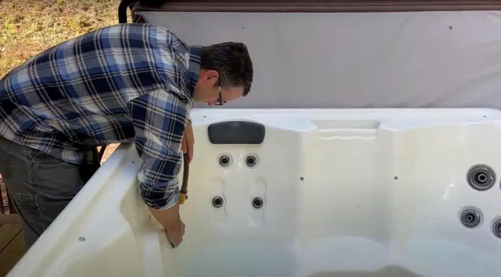 clean the hot tub shell